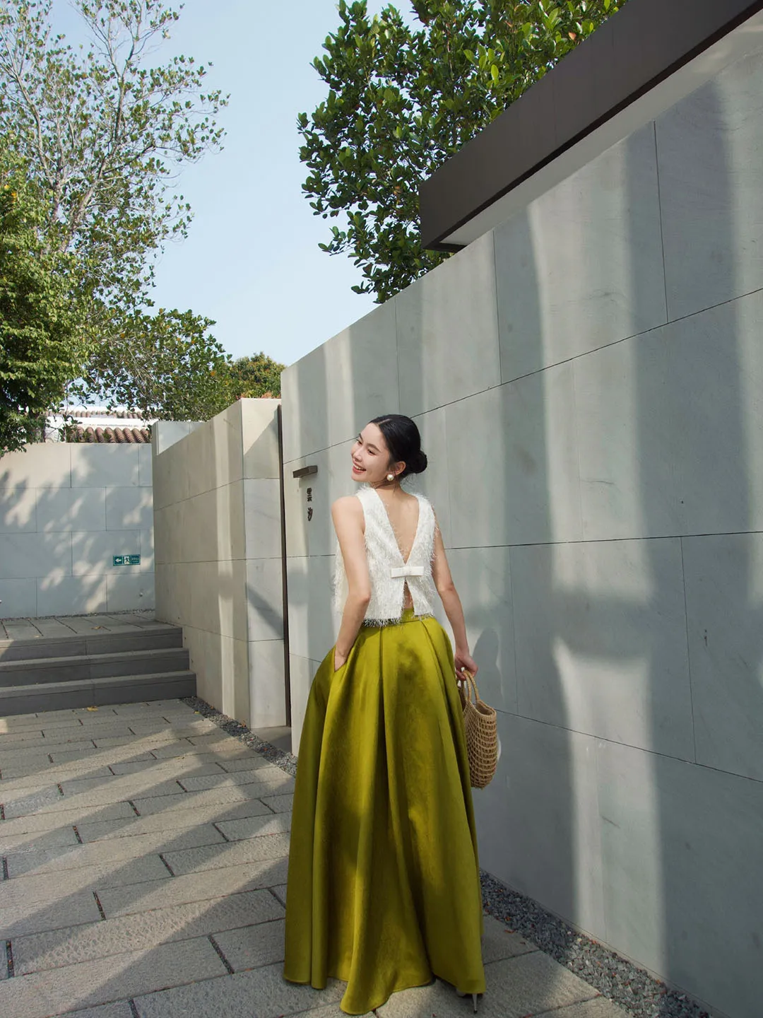Elegant Two-Piece White Textured Sleeveless Top with Flowing Olive Green Maxi Skirt