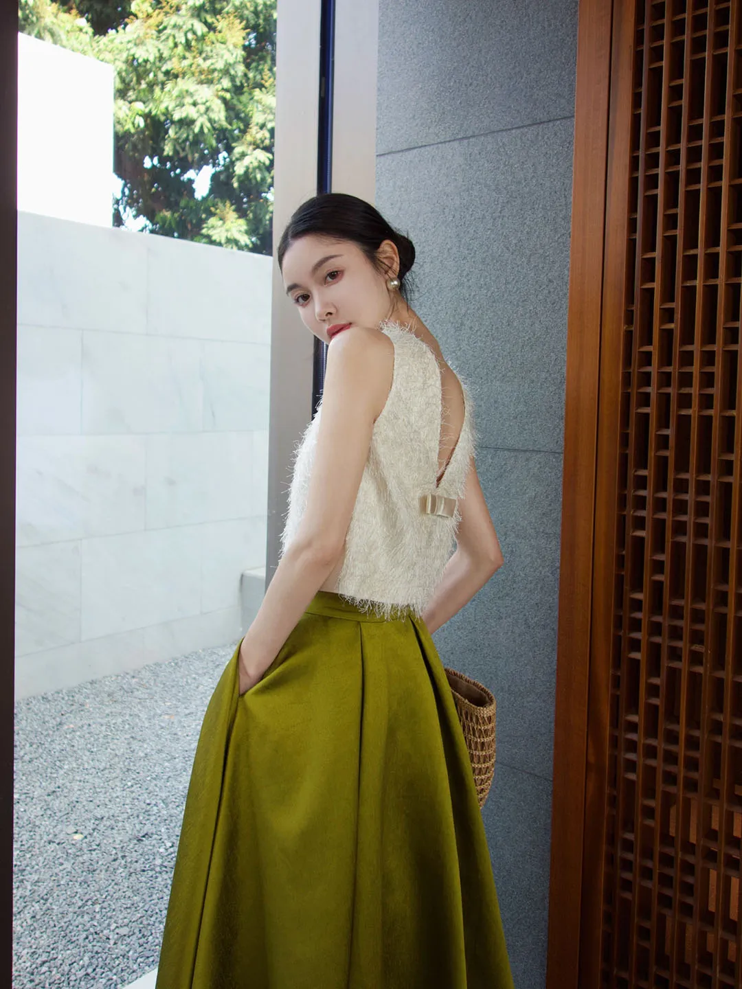 Elegant Two-Piece White Textured Sleeveless Top with Flowing Olive Green Maxi Skirt